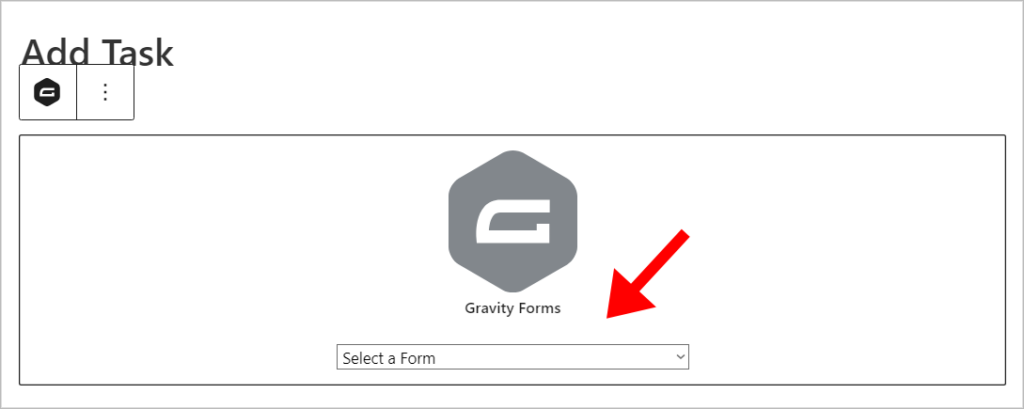 The Gravity Forms block in Gutenberg with an arrow pointing to the 'Select a Form' dropdown